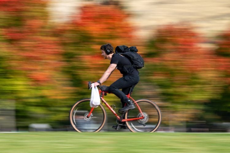 A student riding a bicycle