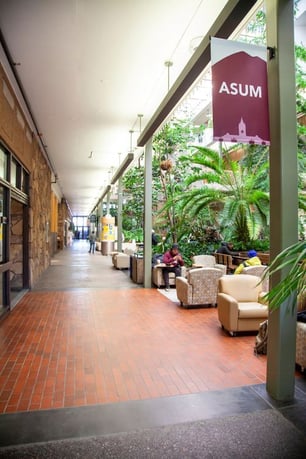 An ASUM banner hangs in the University Center