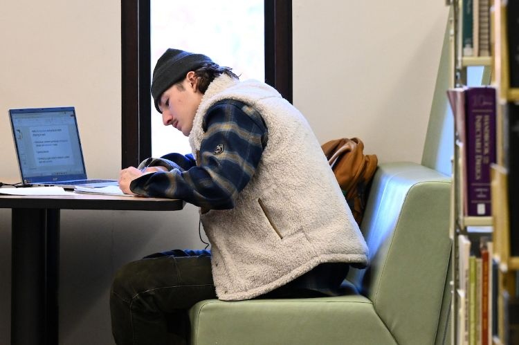 A student studying in the library
