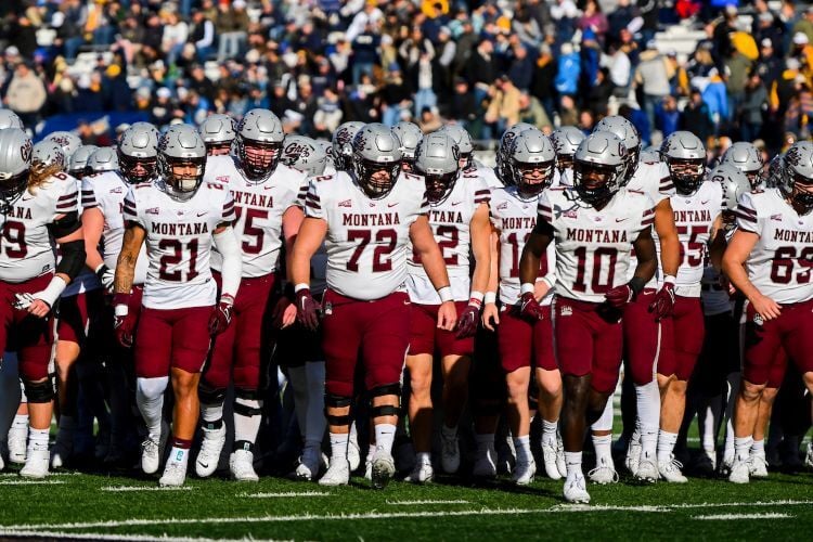 University of Montana Grizzly football players entering the field