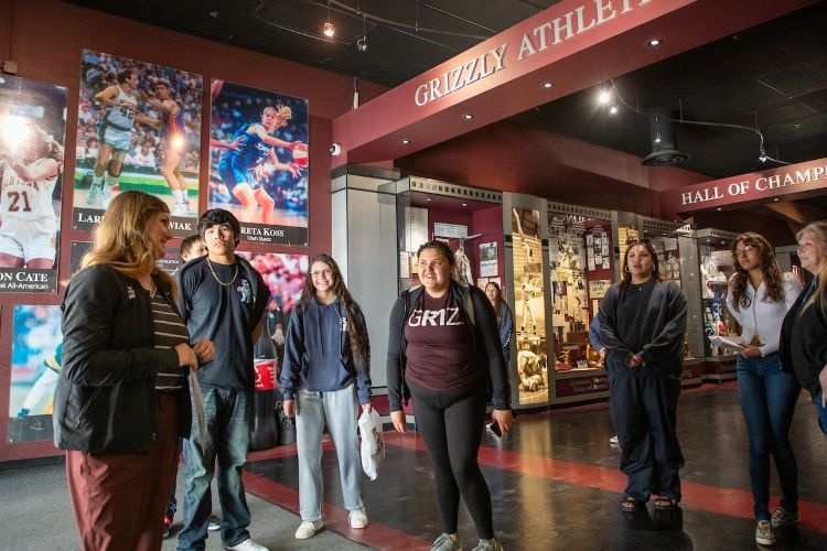 Students touring the Grizzly Athletics Hall of Champions