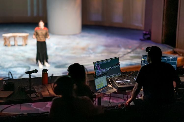 Students behind the scenes of a theater production