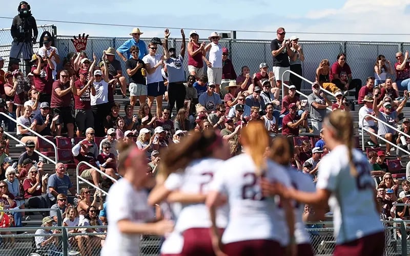 UM soccer fans pack the stands at Dornblaser Field while Griz players celebrate on the field