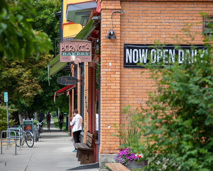 bernices bakery storefront and a person coming out of it