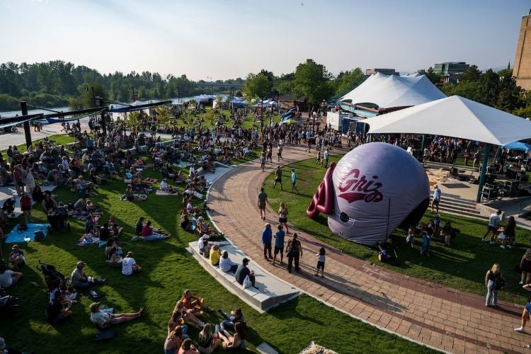 The big Griz Helmet blow up and lots of people at Caras Park