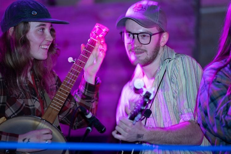 Student musicians play on stage