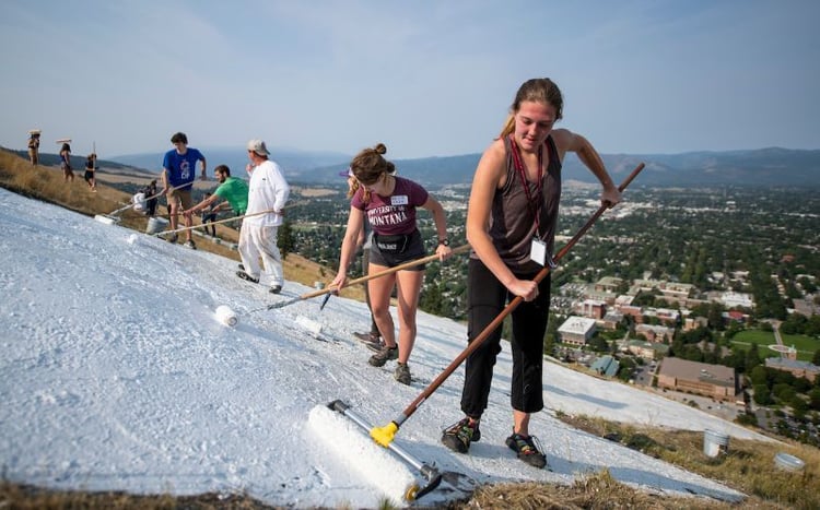 Students painting the "M" on Mount Sentinel