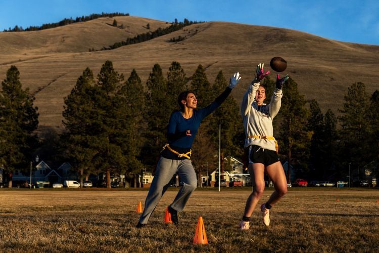 Students playing flag football