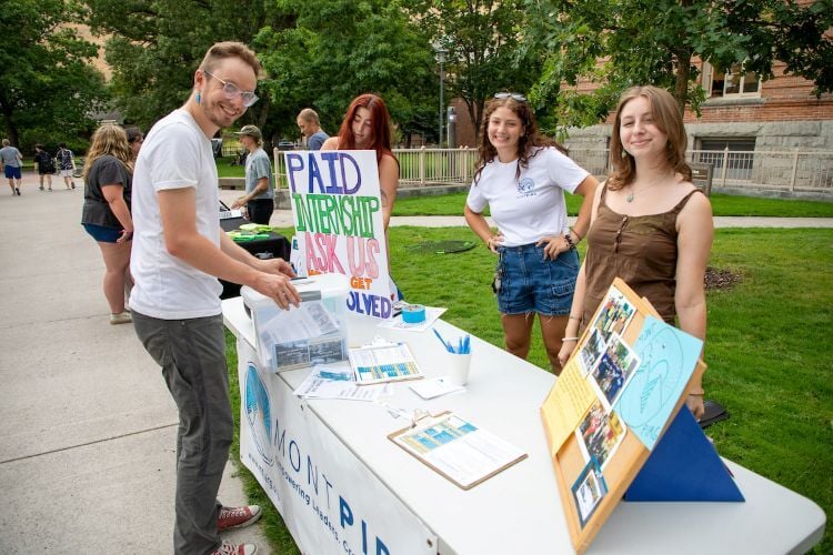 Students tabling outside during Welcome Week