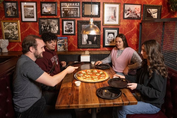 Students eating pizza