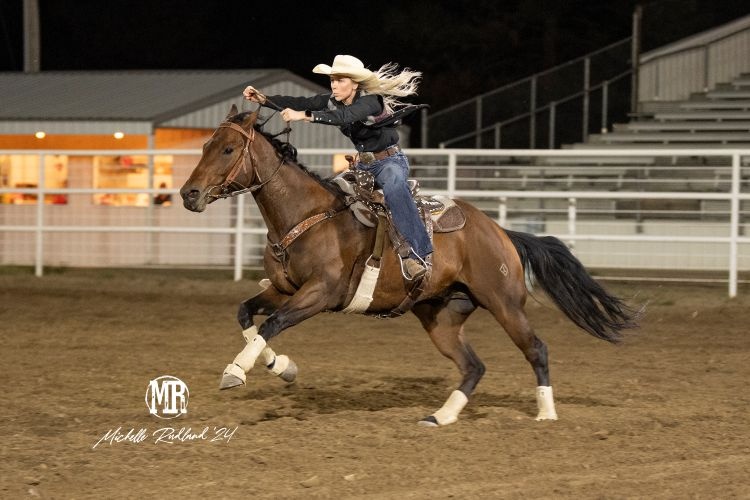 UM Rodeo Student-Athlete Lacey Lawrence atop a horse