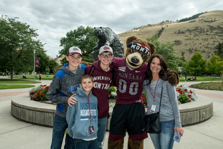 Monte with a family of a Grizzly student