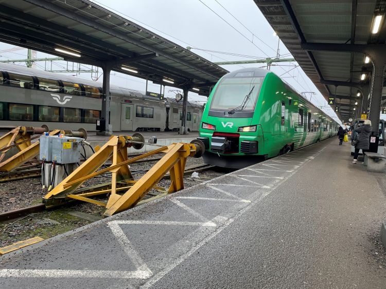 A train pulls up to a station in France
