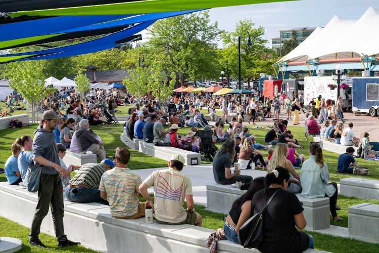 The community enjoys a sunny evening at Caras Park during a Downtown Tonight Celebration
