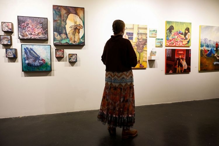 A student appreciating art at the museum