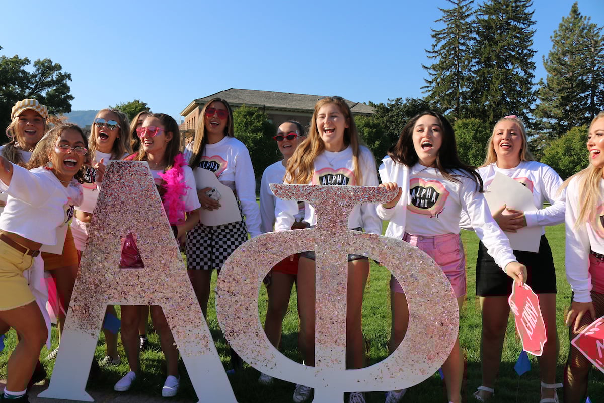 Aplha Phi sorority celebrating on The Oval on campus