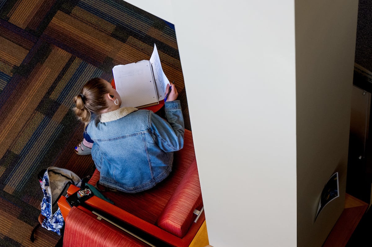 an overhead view of a student in their favorite study spot