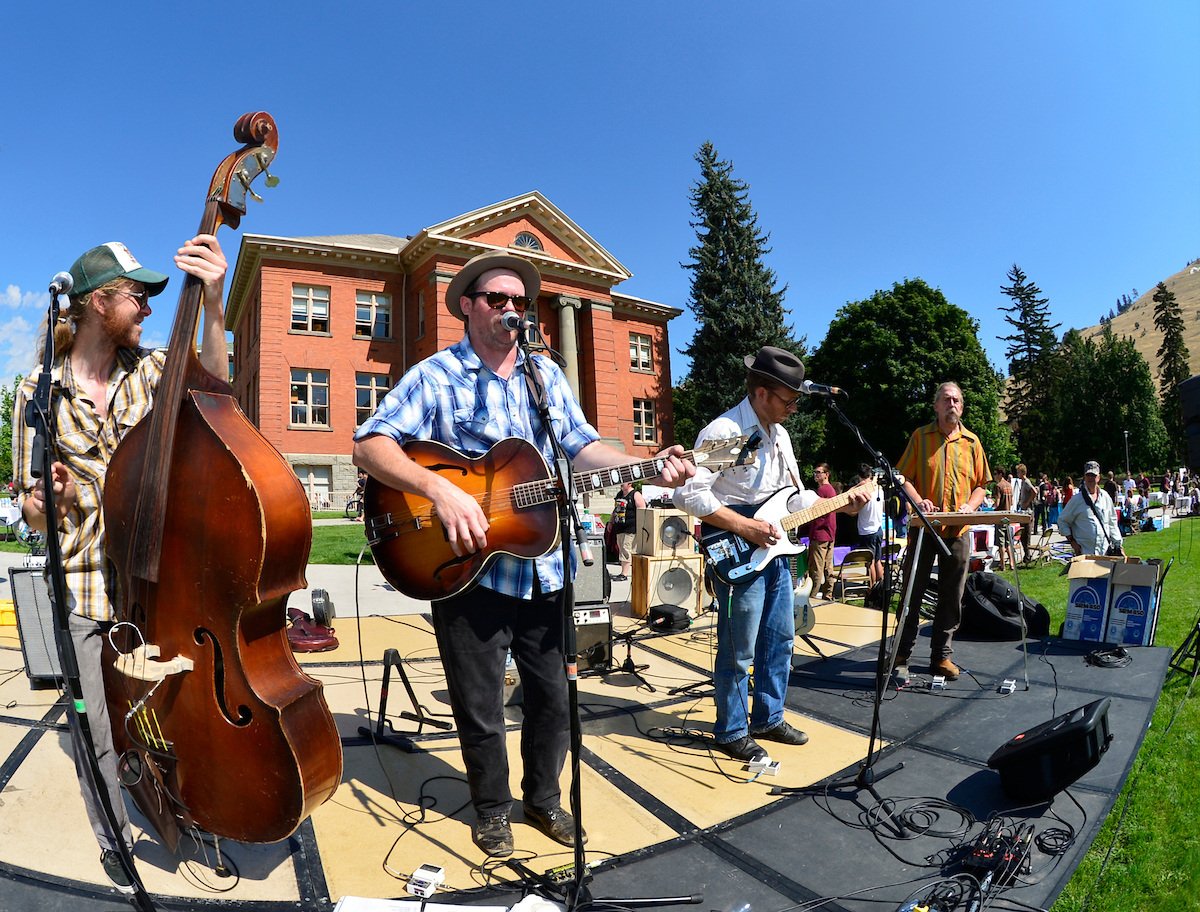 a band playing on the oval during the Weary Travelers Music Festival